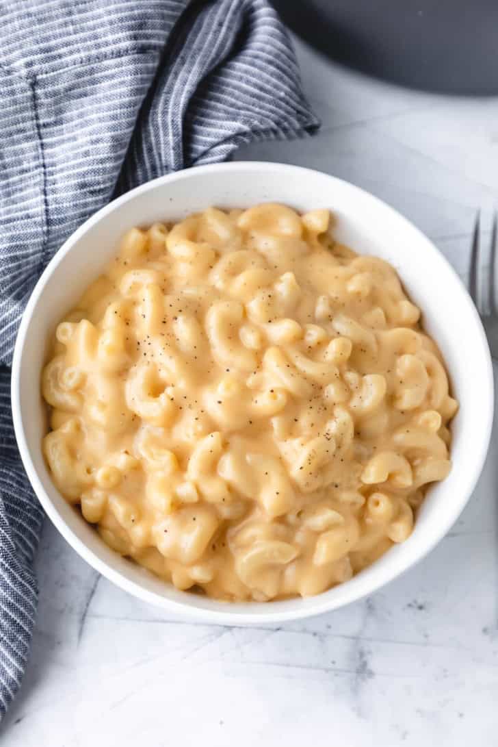 overhead of stovetop mac and cheese in a white bowl.