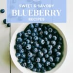 pin for blueberry recipes roundup showing an overhead photo of a bowl of blueberries with text overlay.