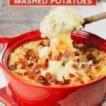 pin showing scooping out some baked mashed potatoes from a casserole dish. with text title overlay.