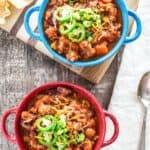 Two bowls of turkey chili with text title overlay for pinterest.